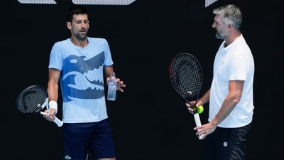 Serbia's Novak Djokovic, left, gestures as talks with coach Goran Ivanisevic during a practice session ahead of the Australian Open (AP) Serbia's Novak Djokovic, left, gestures as talks with coach Goran Ivanisevic during a practice session ahead of the Australian Open (AP)