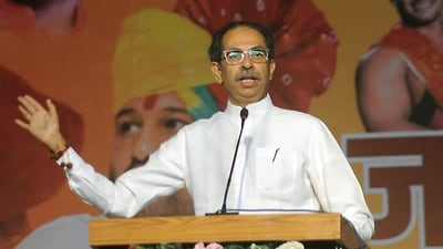 Shiv Sena (UBT) chief Uddhav Thackeray addresses supporters at a rally. (Uday Deolekar/HT photo)