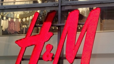 H&M logo is seen on a shop in Riga, Latvia, The company's sales fell by two percent to 53.7 billion kronor. (Reuters)