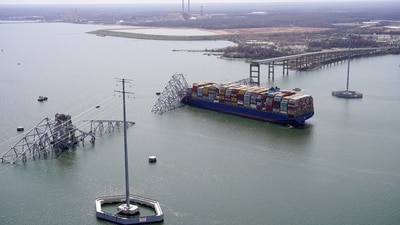 Aerial view of the Dali cargo vessel which crashed into the Francis Scott Key Bridge, causing it to collapse in Baltimore, Maryland, U.S., March 26, 2024. Maryland National Guard/Handout via REUTERS. (via REUTERS)