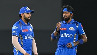 Mumbai Indians' captain Hardik Pandya and his teammate Rohit Sharma (L) (AFP)