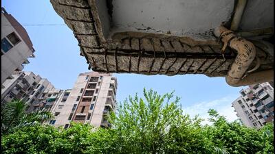 Signature View Apartment, built over 2.16 acres, was launched in 2007, and the possession of flats started in 2012. The complex has 12 towers of 12 and six floors, with a total of 336 HIG and MIG flats. According to residents, the buildings started showing signs of degradation from the first year of inhabitation. (HT Archive) Signature View Apartment, built over 2.16 acres, was launched in 2007, and the possession of flats started in 2012. The complex has 12 towers of 12 and six floors, with a total of 336 HIG and MIG flats. According to residents, the buildings started showing signs of degradation from the first year of inhabitation. (HT Archive)