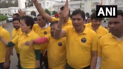 The AAP MLAs, wearing t-shirts with a message ‘Mai Bhi Kejriwal’, protested in the assembly premises and raised slogans (Video grab/ANI) The AAP MLAs, wearing t-shirts with a message ‘Mai Bhi Kejriwal’, protested in the assembly premises and raised slogans (Video grab/ANI)