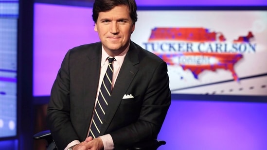FILE - Tucker Carlson, host of "Tucker Carlson Tonight," poses for photos in a Fox News Channel studio on March 2, 2017, in New York. Fox News sent Carlson a “cease-and-desist” letter over his new Twitter series, Axios reported Monday, June 12, 2023, amid reports of contract battles between the conservative network and its former prime-time host. (AP Photo/Richard Drew, File) (AP)