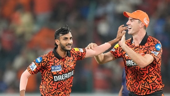 Sunrisers Hyderabad's captain Pat Cummins, right, and Shahbaz Ahmed celebrates the dismissal of Mumbai Indians' Ishan Kishan Sunrisers Hyderabad's captain Pat Cummins, right, and Shahbaz Ahmed celebrates the dismissal of Mumbai Indians' Ishan Kishan