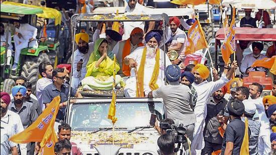Shiromani Akali Dal (SAD) leaders Harsimrat Kaur Badal and Sukhbir Singh Badal during a road show ahead of the Lok Sabha polls, in Mansa on Wednesday. (PTI)