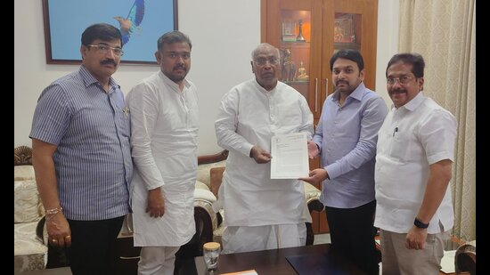 Vishal Patil and another senior Congress leader Vishwajeet Kadam met Congress President Mallikarjun Kharge in Delhi on Wednesday. (HT PHOTO)
