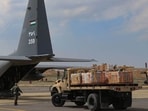 This handout picture shows humanitarian aid being loaded into a military aircraft to be dropped over northern Gaza