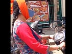 Snapshot of the woman with her phone wrapped to her ear. Snapshot of the woman with her phone wrapped to her ear.