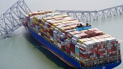 In this aerial image released by the Maryland National Guard, the cargo ship Dali is stuck under part of the structure of the Francis Scott Key Bridge after the ship hit the bridge, Tuesday, March 26, 2024, in Baltimore. (AP) In this aerial image released by the Maryland National Guard, the cargo ship Dali is stuck under part of the structure of the Francis Scott Key Bridge after the ship hit the bridge, Tuesday, March 26, 2024, in Baltimore. (AP)