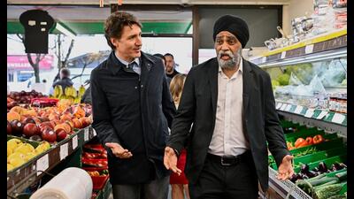 Canada's Prime Minister Justin Trudeau (left) and Minister of Emergency Preparedness Harjit S Sajjan visit the Punjab Food Centre in Vancouver, British Columbia, Canada, on Wednesday. (REUTERS) Canada's Prime Minister Justin Trudeau (left) and Minister of Emergency Preparedness Harjit S Sajjan visit the Punjab Food Centre in Vancouver, British Columbia, Canada, on Wednesday. (REUTERS)