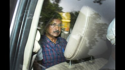 Delhi chief minister Arvind Kejriwal being taken from ED office to Rouse Avenue Court on Thursday. (Sanjeev Verma/HT Photo)