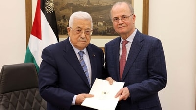 Palestinian President Mahmoud Abbas and PM Mohammad Mustafa (via REUTERS)