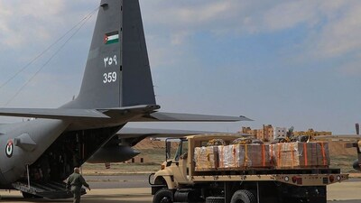 This handout picture shows humanitarian aid being loaded into a military aircraft to be dropped over northern Gaza (AFP) This handout picture shows humanitarian aid being loaded into a military aircraft to be dropped over northern Gaza (AFP)