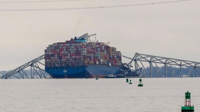A container ship rests against wreckage of the Francis Scott Key Bridge on Wednesday, March 27, 2024, in Baltimore, Md. (AP) A container ship rests against wreckage of the Francis Scott Key Bridge on Wednesday, March 27, 2024, in Baltimore, Md. (AP)