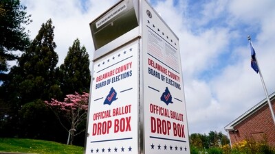 FILE - A Delaware County secured drop box for the return of vote-by-mail ballots is pictured, May 2, 2022, in Newtown Square, Pa. An exterior envelope date requirement in Pennsylvania's mail-in voting system does not run afoul of a civil rights law, a federal appeals court panel said Wednesday, March 27, 2024, in overturning a lower-court ruling. (AP Photo/Matt Rourke, File) (AP) FILE - A Delaware County secured drop box for the return of vote-by-mail ballots is pictured, May 2, 2022, in Newtown Square, Pa. An exterior envelope date requirement in Pennsylvania's mail-in voting system does not run afoul of a civil rights law, a federal appeals court panel said Wednesday, March 27, 2024, in overturning a lower-court ruling. (AP Photo/Matt Rourke, File) (AP)