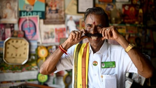 Independent candidate K. Padmarajan, a tyre repair shop owner popularly known as "Election King". (AFP)