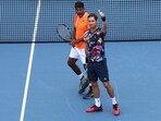 Rohan Bopanna of India and Matthew Ebden of Australia celebrate their win against Marcel Granollers of Spain and Horacio Zeballos of Argentina.