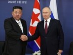 Russian President Vladimir Putin, right, and North Korean leader Kim Jong Un shake hands Russian President Vladimir Putin, right, and North Korean leader Kim Jong Un shake hands