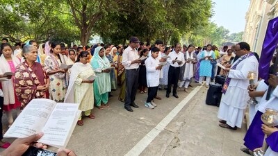 Devotees offer prayers on Good Friday as a solemn and significant part of their observance of the crucifixion of Jesus Christ. (ANI) Devotees offer prayers on Good Friday as a solemn and significant part of their observance of the crucifixion of Jesus Christ. (ANI)