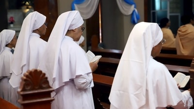 Nuns offer prayers on Good Friday (the day marking the crucifixion of Lord Jesus Christ), at a church in Prayagraj on Friday. (Ravi Prakash) Nuns offer prayers on Good Friday (the day marking the crucifixion of Lord Jesus Christ), at a church in Prayagraj on Friday. (Ravi Prakash)