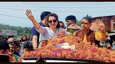 BJP’s Lok Sabha candidate from Mandi Kangana Ranaut during a roadshow in Sarkaghat on Friday. (HT Photo) BJP’s Lok Sabha candidate from Mandi Kangana Ranaut during a roadshow in Sarkaghat on Friday. (HT Photo)