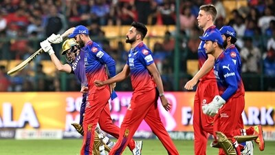 Kolkata Knight Riders' Phil Salt (L) and Royal Challengers Bengaluru' players enter the pitch during the Indian Premier League (IPL) Twenty20 cricket match between Royal Challengers Bengaluru and Kolkata Knight Riders (AFP) Kolkata Knight Riders' Phil Salt (L) and Royal Challengers Bengaluru' players enter the pitch during the Indian Premier League (IPL) Twenty20 cricket match between Royal Challengers Bengaluru and Kolkata Knight Riders (AFP)