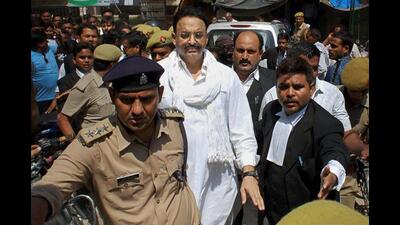 Mukhtar Ansari being produced in a special court in connection with various criminal cases filed against him, in 2018. (PTI File) Mukhtar Ansari being produced in a special court in connection with various criminal cases filed against him, in 2018. (PTI File)