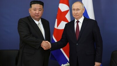 Russian President Vladimir Putin, right, and North Korean leader Kim Jong Un shake hands (AP) Russian President Vladimir Putin, right, and North Korean leader Kim Jong Un shake hands (AP)