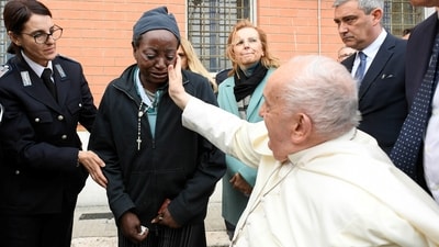 Many of the women wept as Francis washed their feet, gently pouring water over one bared foot and patting it dry with a small towel.&nbsp;&nbsp; (via REUTERS)