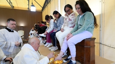 Pope Francis washes the feet of inmates of the female section of Rebibbia Prison during a Holy Thursday ritual, (via REUTERS)