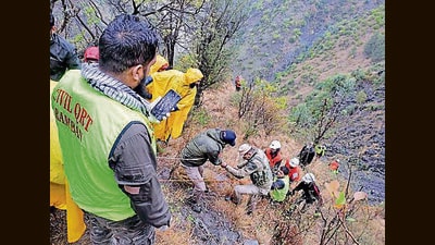 Rescue work underway on the Jammu-Srinagar NH near Battery Chashma in Ramban on Friday. (PTI) Rescue work underway on the Jammu-Srinagar NH near Battery Chashma in Ramban on Friday. (PTI)