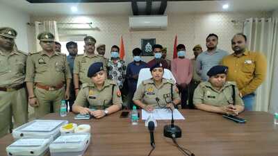 The four accused in police custody. (HT Photo)