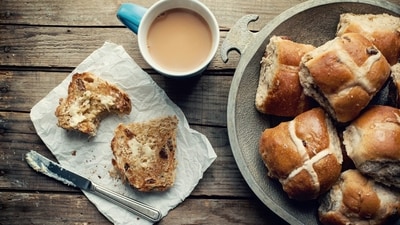 Hot Cross Buns (United Kingdom): A quintessential Easter treat in the UK, these spiced sweet buns are marked with a cross on top, symbolizing the crucifixion. They are traditionally enjoyed on Good Friday but are popular throughout the Easter period. (Unsplash) Hot Cross Buns (United Kingdom): A quintessential Easter treat in the UK, these spiced sweet buns are marked with a cross on top, symbolizing the crucifixion. They are traditionally enjoyed on Good Friday but are popular throughout the Easter period. (Unsplash)
