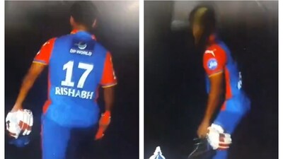 Rishabh Pant smashing his bat against the sight screen Rishabh Pant smashing his bat against the sight screen
