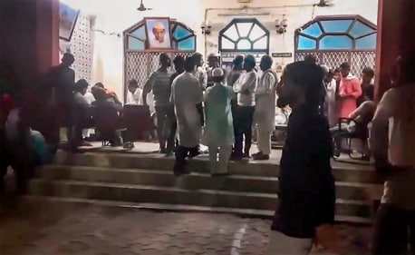 People gather at the residence of the jailed gangster-turned-politician Mukhtar Ansari in Uttar Pradesh's Ghazipur on March 28. (PTI) People gather at the residence of the jailed gangster-turned-politician Mukhtar Ansari in Uttar Pradesh's Ghazipur on March 28. (PTI)