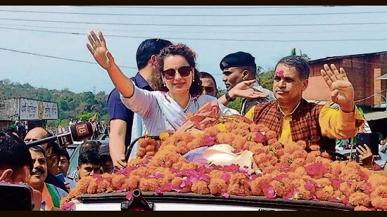 BJP’s Lok Sabha candidate from Mandi Kangana Ranaut during a roadshow in Sarkaghat on Friday. (HT Photo)