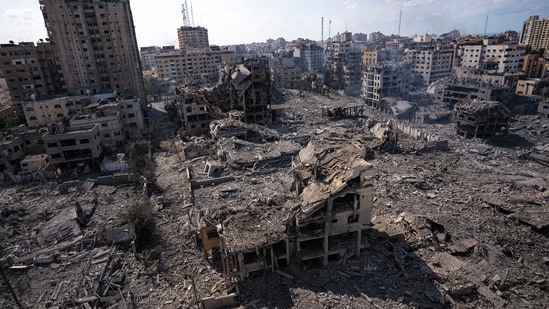 Israel-Hamas war: A view of the rubble of buildings hit by an Israeli airstrike in Gaza City (AP)