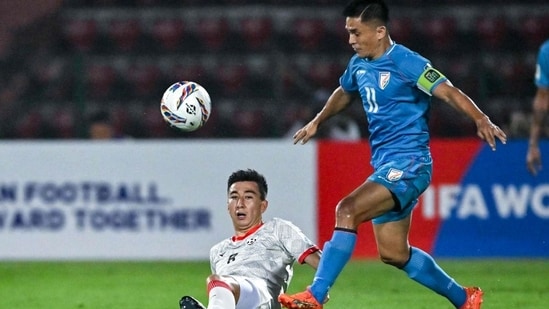 Sunil Chhetri fights for the ball with Afghanistan's Rahmat Akbari during the 2026 FIFA World Cup qualifiers (PTI)