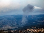 Smoke billows following an Israeli air strike on the outskirts of the village of el-Habbariyeh in the southern Lebanese Hasbaya district on the border with Israel