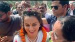 BJP candidate actor Kangana Ranaut during a roadshow ahead of the Lok Sabha elections in Mandi on Friday. (PTI)