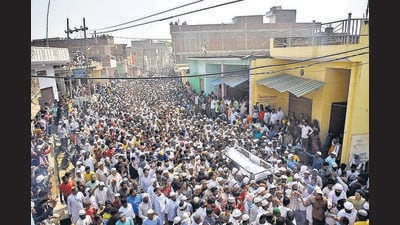 A crowd gathers at the residence of the gangster-turned-politician Mukhtar Ansari during his funeral procession in Ghazipur, Saturday. (PTI) A crowd gathers at the residence of the gangster-turned-politician Mukhtar Ansari during his funeral procession in Ghazipur, Saturday. (PTI)