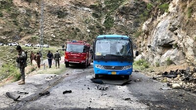 Security personnel inspect the site of the suicide attack near Besham city in the Shangla district of Khyber Pakhtunkhwa province on March 26. Five Chinese nationals working on a major dam construction site were killed in the attack. (AFP) Security personnel inspect the site of the suicide attack near Besham city in the Shangla district of Khyber Pakhtunkhwa province on March 26. Five Chinese nationals working on a major dam construction site were killed in the attack. (AFP)