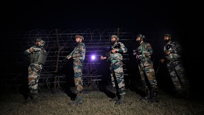 Indian Army soldiers stand guard near the Line of Control (LoC) after an infiltration attempt by four heavily-armed terrorists at Akhnoor, in Jammu district, Saturday. (PTI) Indian Army soldiers stand guard near the Line of Control (LoC) after an infiltration attempt by four heavily-armed terrorists at Akhnoor, in Jammu district, Saturday. (PTI)