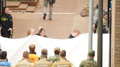 Three hostages leave after being held in the cafe Petticoat in Ede, on March 30, 2024. Authorities have evacuated the centre of the town of Ede since early morning, after several people were held at the Cafe Petticoat. "Three hostages have just been released. The situation is not over yet," police said in a statement on X, formerly Twitter. (AFP) Three hostages leave after being held in the cafe Petticoat in Ede, on March 30, 2024. Authorities have evacuated the centre of the town of Ede since early morning, after several people were held at the Cafe Petticoat. "Three hostages have just been released. The situation is not over yet," police said in a statement on X, formerly Twitter. (AFP)