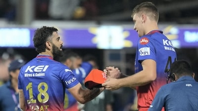 Virat Kohli being given the Orange Cap at the end of RCB's innings. (PTI) Virat Kohli being given the Orange Cap at the end of RCB's innings. (PTI)