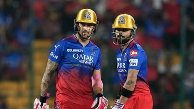 Royal Challengers Bengaluru's Virat Kohli, right, stands between the wickets with captain Faf du Plessis (AP) Royal Challengers Bengaluru's Virat Kohli, right, stands between the wickets with captain Faf du Plessis (AP)