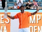 Rohan Bopanna of India celebrates his victory.