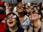 Solar Eclipse 2024: People watch the Solar Eclipse from the observation deck of The Empire State Building in New York City in 2017. 