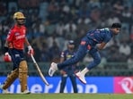 Lucknow Super Giants' Mayank Yadav bowls a delivery.